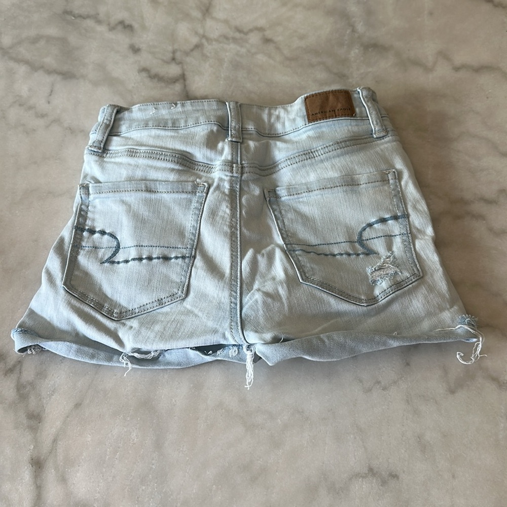 American Eagle Next Level Stretch Hi Rise Shortie Denim Shorts - Picture 2 of 12